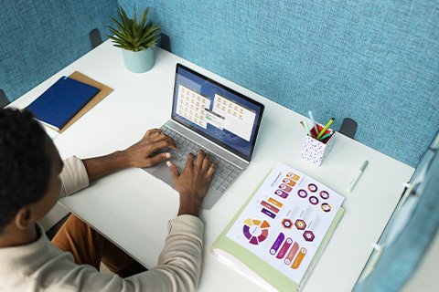 digital composite of laptop with graphic